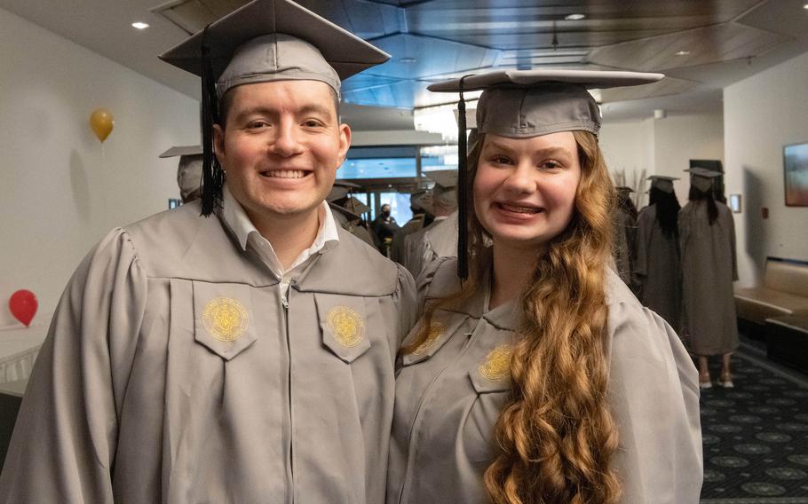 Matthew and Kristina Ybara are photographed shortly before earning their associate degrees at a ceremony on Ramstein Air Base, Germany, Saturday, April 29, 2023. They are among 60% of UMGC students who are married. 