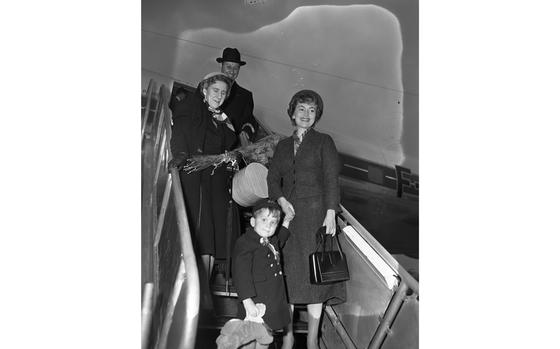Rhein Main Airport, Frankfurt, Germany, Oct. 29, 1953: Actress Olivia de Havilland arrives at Frankfurt’s Rhein-Main airport aboard Air France’s inaugural Chicago-Frankfurt flight October 29, 1953. Accompanying her were her fiancé Pierre Galente (not pictured), executive editor of the French weekly news magazine Paris Match, and her 4-year old son from her first marriage, Benjamin Goodrich.

Looking for Stars and Stripes’ historic coverage? Subscribe to Stars and Stripes’ historic newspaper archive! We have digitized our 1948-1999 European and Pacific editions, as well as several of our WWII editions and made them available online through https://starsandstripes.newspaperarchive.com/

META TAGS: Europe; West Germany; airport; air travel; aviation; Air France; inaugural flight; passengers; actress; entertainment; film star; celebrity; Samuel Vestal