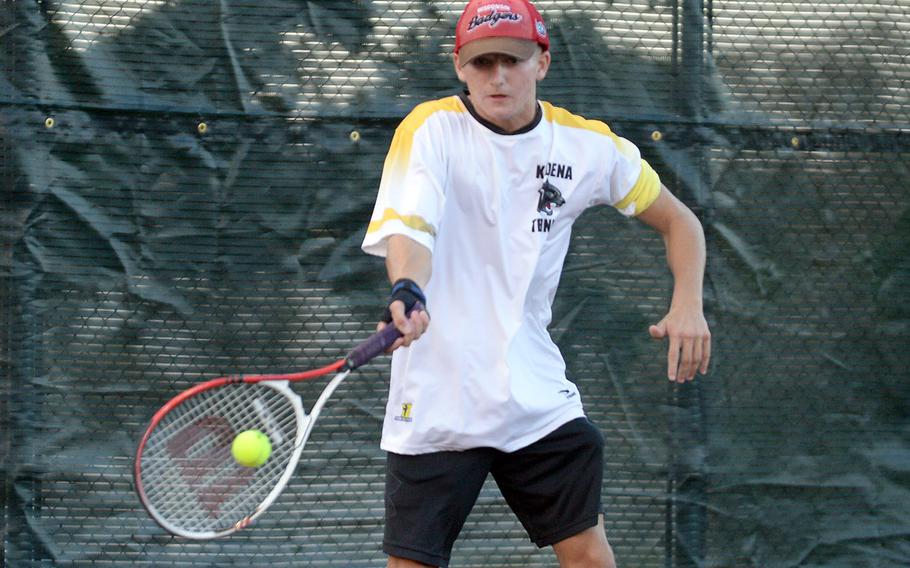 Kadena's Micah Berry hits a forehand return.