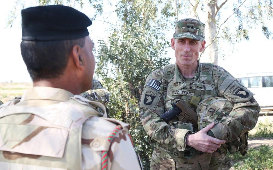 Then U.S. Army Maj. Gen. Gary J. Volesky speaks with Iraqi army Col. Jalood at Camp Taji, Iraq, March 16, 2016. The U.S. Army has suspended the now retired Lt. Gen. Volesky from his mentorship role and placed him under investigation after he posted a tweet that appeared to mock first lady Jill Biden’s tweet about the Supreme Court’s recent decision on abortion.