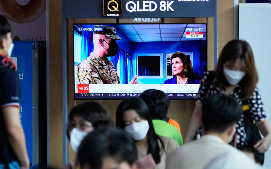 A TV screen shows a news program reporting about U.S. House Speaker Nancy Pelosi was visiting the Joint Security Area of the inter-Korean truce village of Panmunjom, at the Seoul Railway Station in Seoul, South Korea.