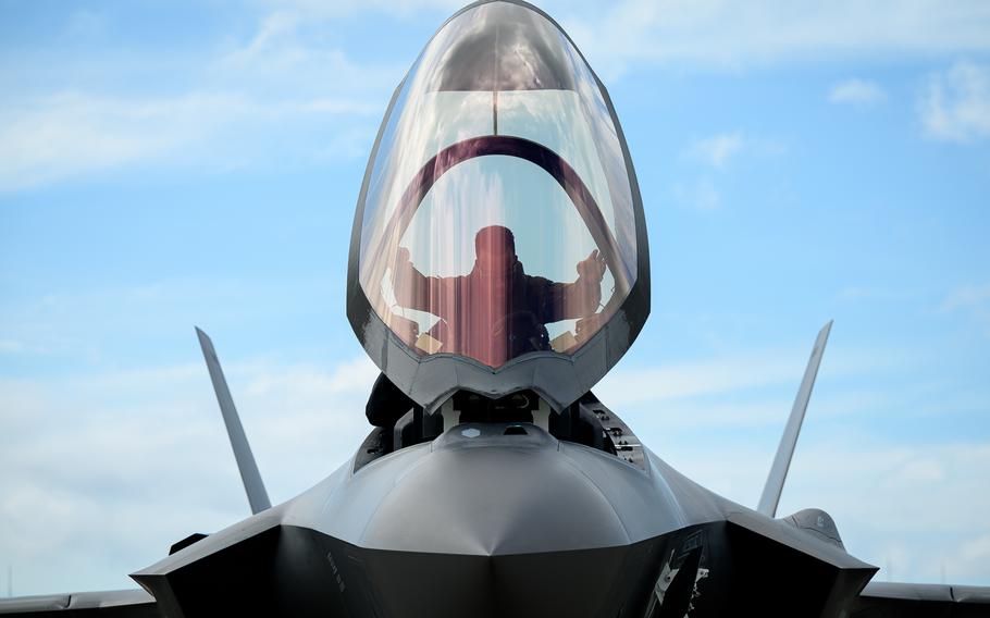 A U.S. Air Force pilot assigned to the 356th Expeditionary Fighter Squadron boards an F-35A cockpit at Marine Corps Air Station Iwakuni, Japan, June 28, 2022. Air Combat Command shut down the majority of the Air Force’s F-35s late July after finding faulty devices in the jets’ ejection seats. The jets have since returned to service. 