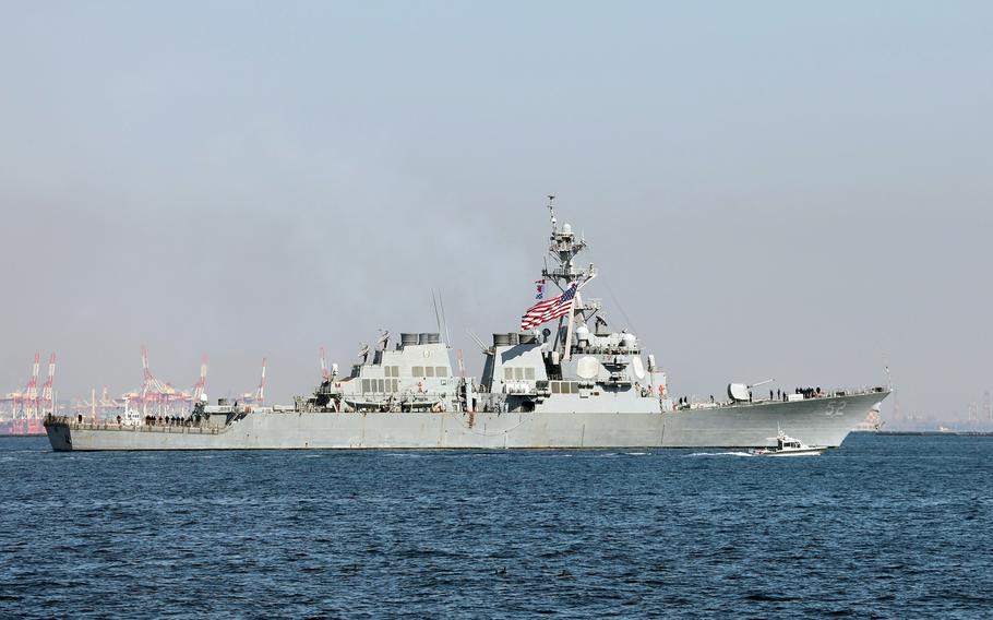 The guided-missile destroyer USS Barry departs Yokosuka Naval Base, Japan, while shifting its homeport to Naval Station Everett, Wash., Friday, Feb. 17, 2023.