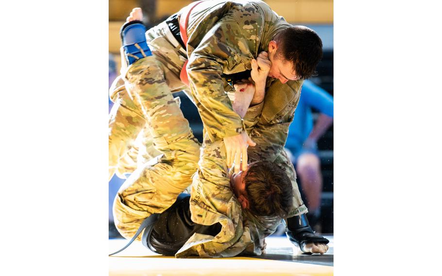 Soldiers fight Tuesday, April 11, 2023 in a bout during the annual Lacerda Cup All-Army Combatives Championship bout at Fort Benning, Ga.
