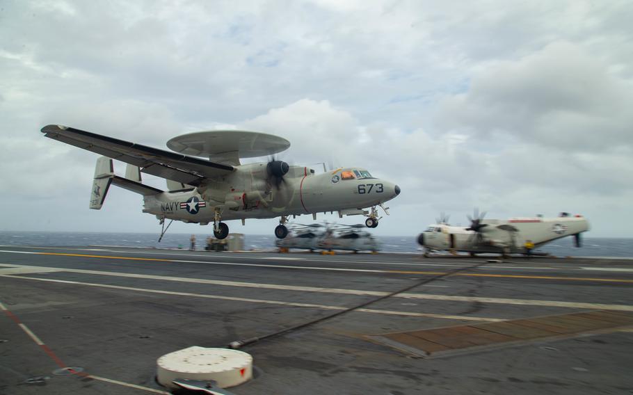 An E-2D Advanced Hawkeye assigned to the VAW-120 squadron lands on the USS Gerald R. Ford’s flight deck in 2020 while underway in the Atlantic Ocean. One of the unit’s E-2Ds crashed on March 30, 2022, during routine flight operations off the coast of Virginia.