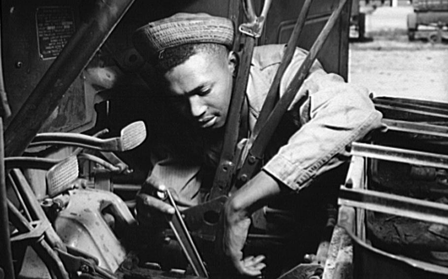 An African American soldier, who serves as a truck driver and mechanic, works on a transmission at Fort Knox, Ky., in 1942. In 1943, a bloody battle between Black and white U.S. soldiers took place at Bamber Bridge, England. Several of the Black soldiers were in transportation units. At the time, military units were segregated, with Black units mostly having white commanders.