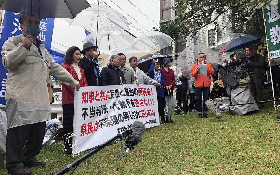 Protesters rally in a park across from the Fukuoka High Court, Naha branch, in Naha, Okinawa, Japan, on Dec. 20, 2023.