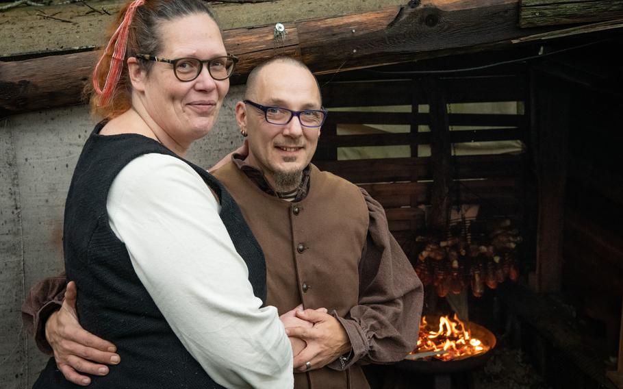 Viktoria and Florian Gerss donned medieval German outfits to welcome Sgt. Stuart McMullen and Pfc. Jaheim McLain, both with the 515th Transportation Company, to their home near the town of Birkenfeld, Germany, on Christmas Eve 2023 as part of Operation Good Cheer, which pairs single American soldiers with German families.