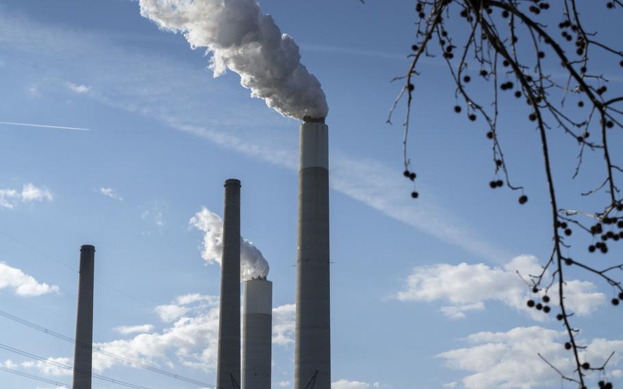 Cooling towers at the John E. Amos coal-fired power plant in Poca, W.Va., on Feb. 11, 2022. 