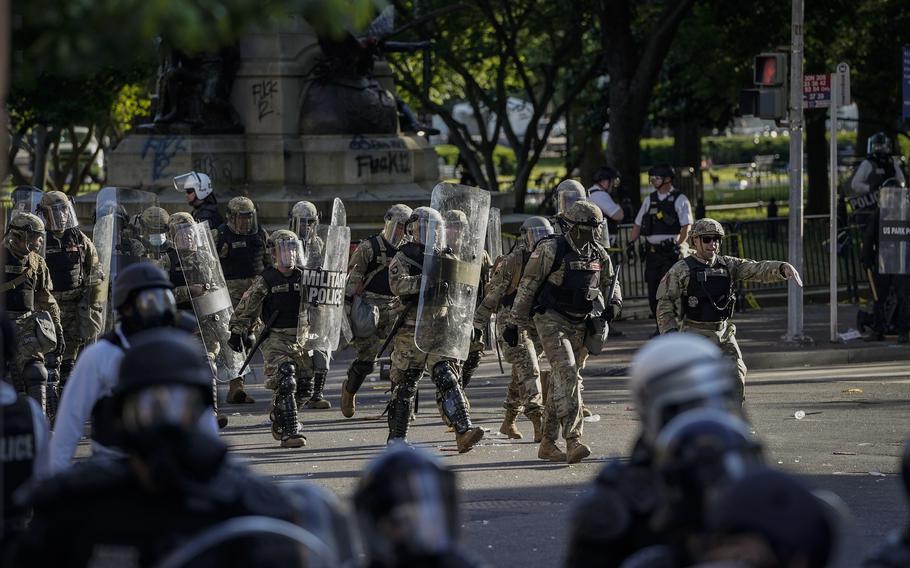 Law enforcement responds during a protest near Lafayette Park ahead of President Trump’s trip to St. John’s Church on June 1, 2020, in Washington, D.C.