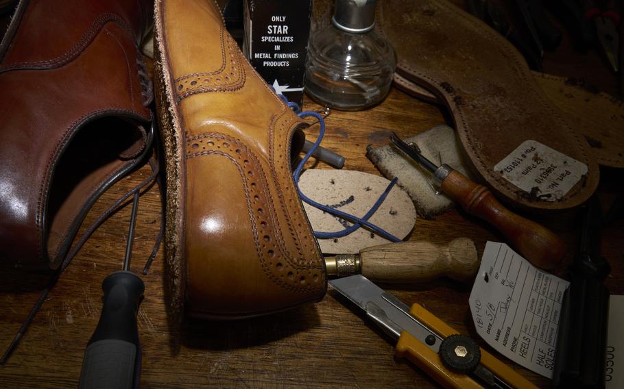 Shoes in the Potters’ repair workshop in Tennessee. Co-owner Trenton Potter has long observed a decline in quality among popular shoe brands as companies continue to outsource manufacturing, cut costs and churn out new styles.