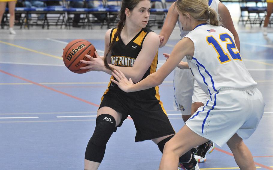 Wiesbaden's Kate Olson guards Stuttgart's Isabella Henderson in the championship game of the DODEA-Europe Division I girls basketball tournament on Saturday, Feb. 26, 2022.