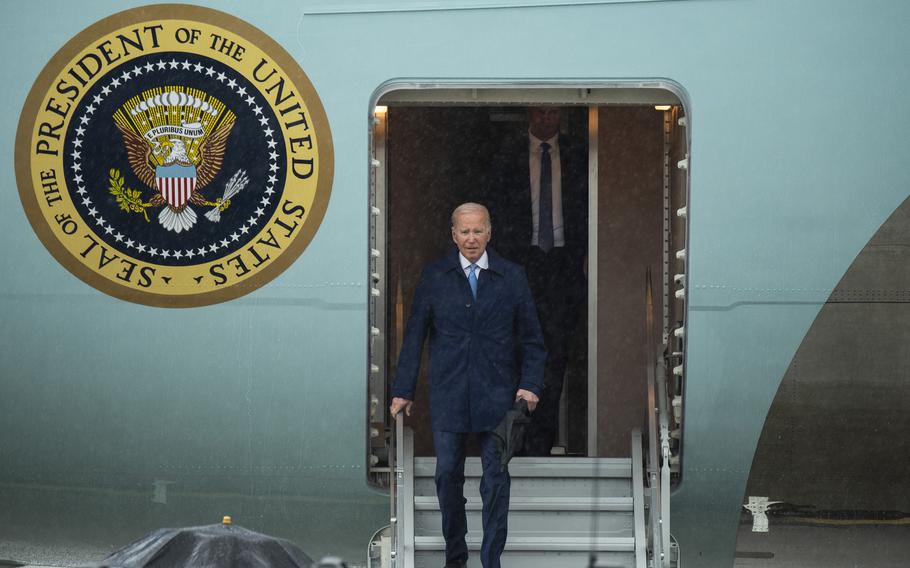 President Joe Biden departs Air Force One after landing at Marine Corps Air Station Iwakuni, Japan, Thursday, May 18, 2023.