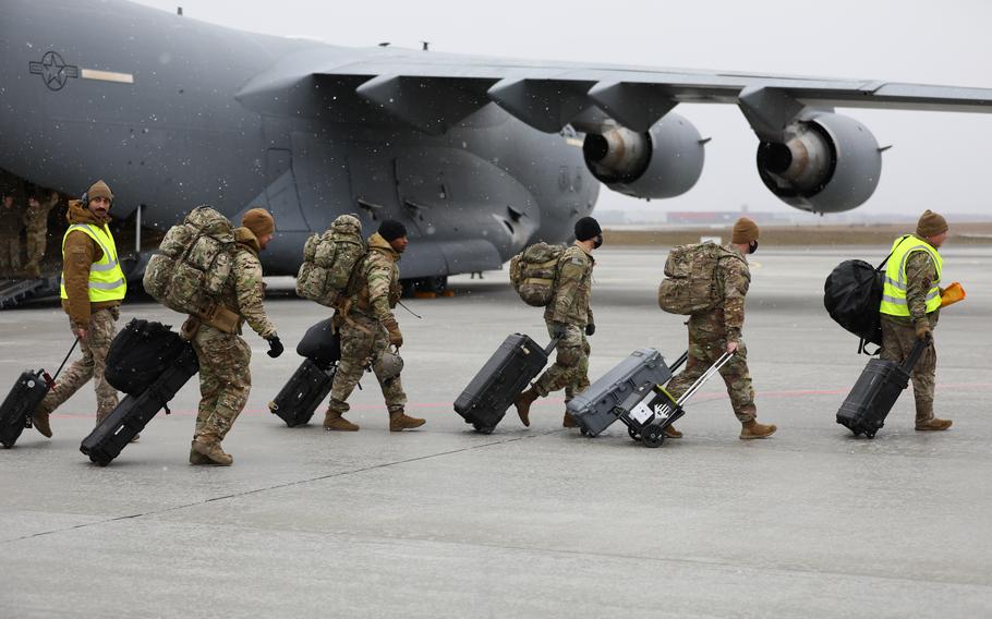 Paratroopers from the 82nd Airborne Division arrive at Rzeszow-Jasionka Airport, Poland, Feb. 6, 2022. The troops won’t be expected to evacuate Americans from Ukraine if Russia launches a new invasion, said President Joe Biden, who added that U.S. citizens should leave Ukraine immediately. 