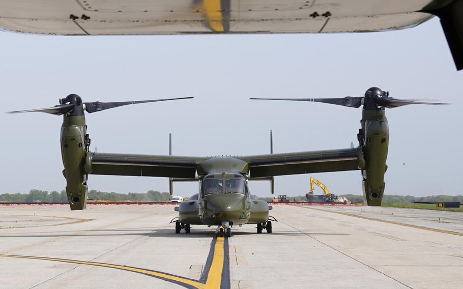 A U.S. Marine Corps Osprey aircraft taxies behind an Osprey carrying members of the White House press corps at Andrews Air Force Base, Md., April 24, 2021. Japan’s defense chief says Japanese and American V-22 Ospreys are being safely operated in the country. Defense Minister Minoru Kihara said Friday that he has no plans to request a flight suspension despite restrictions in the U.S. 