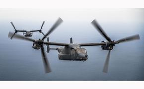CV-22 Ospreys assigned to the 21st Special Operations Squadron approach an MC-130J Commando II for aerial refueling over the Sea of Japan, March 17, 2023. 