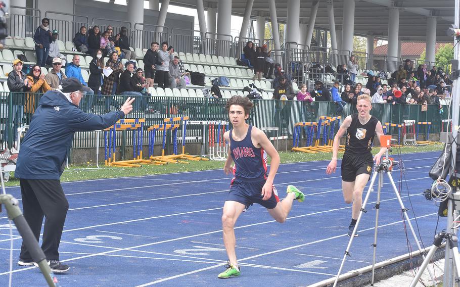 Aviano's Ben Udall holds off Vicenza's Matthias Ganley to win the boys' 1,600 on Saturday, April 23, 2022 at a DODEA-Europe track meet in Pordenone, Italy.