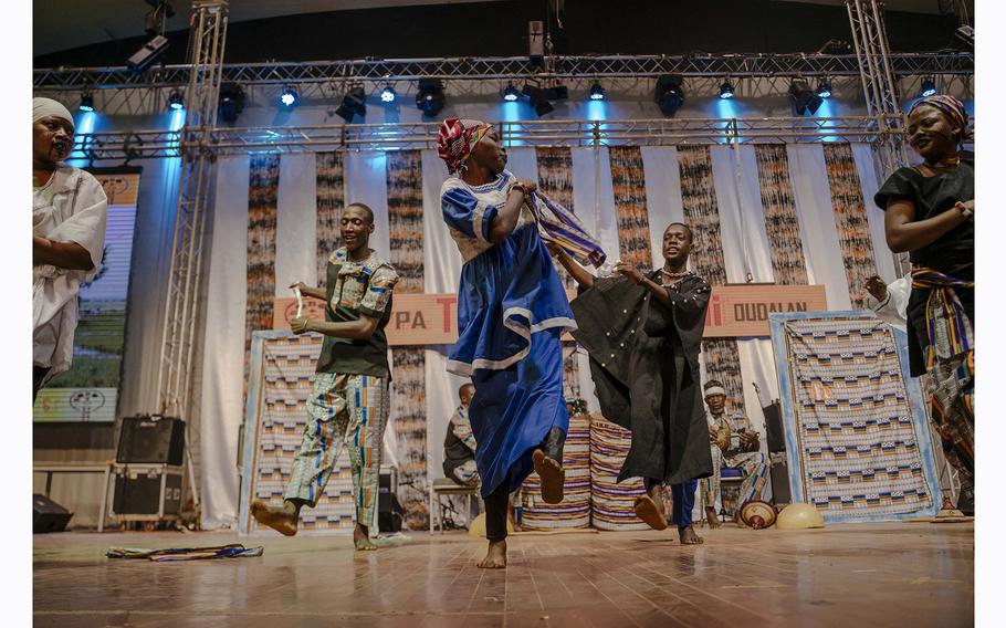 Members of the traditional dance troupe from Burkina Faso’s Sahel region perform at a national competition in Bobo-Dioulasso on April 30, 2024.