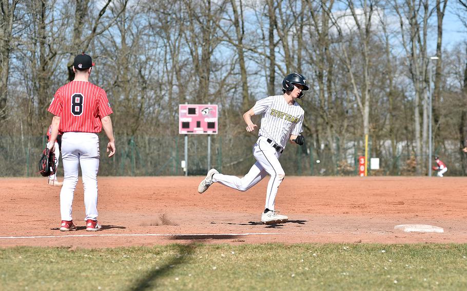 Jaxin Schneiders rounds third.