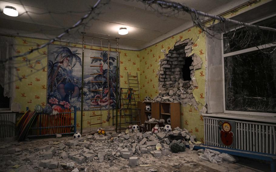 A photograph shows debris after the reported shelling of a kindergarden in the settlement of Stanytsia Luhanska, Ukraine, on Thursday, Feb. 17, 2022. U.S. Defense Secretary Lloyd Austin warned on Feb. 17, 2022, of a provocation by Moscow to justify military intervention in Ukraine after “disturbing” reports of mutual accusations of bombing between the Ukrainian military and pro-Russian separatists.