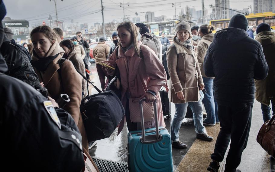 Residents wait to leave the capital as trains are delayed or cancelled at Kyiv-Pasazhyrskyi railway station in Kyiv, Ukraine, on Feb. 24, 2022. 