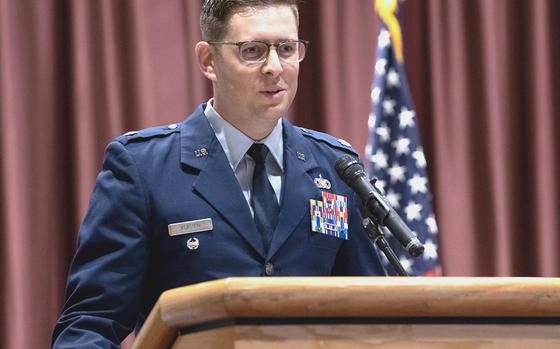 Lt. Col. Adam Kurzen speaks at the ceremony activating his new command, the 9th Field Investigations Squadron, at Yokota Air Base, Japan, July 25, 2023.  
