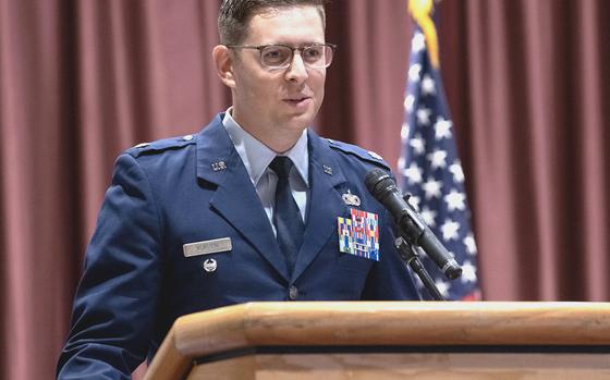 Lt. Col. Adam Kurzen speaks at the ceremony activating his new command, the 9th Field Investigations Squadron, at Yokota Air Base, Japan, July 25, 2023.  
