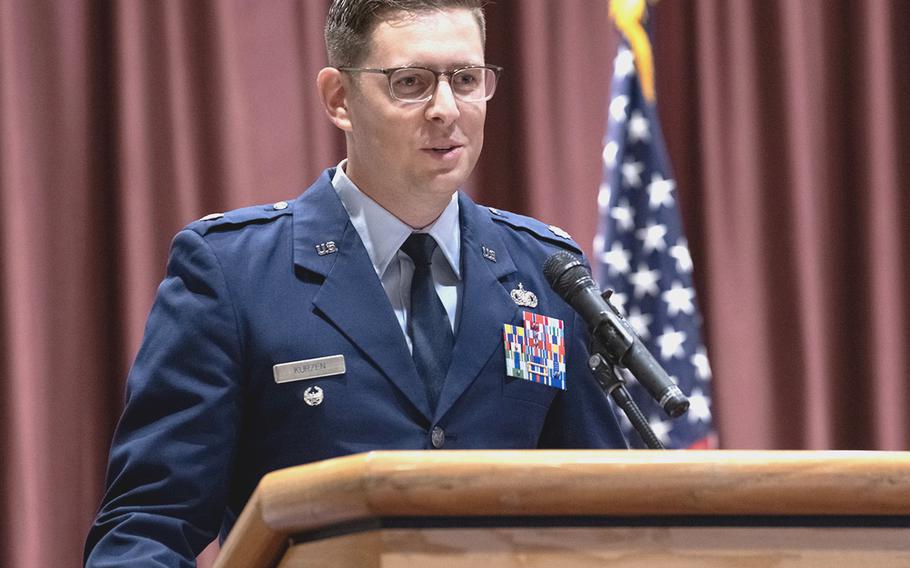 Lt. Col. Adam Kurzen speaks at the ceremony activating his new command, the 9th Field Investigations Squadron, at Yokota Air Base, Japan, July 25, 2023.  