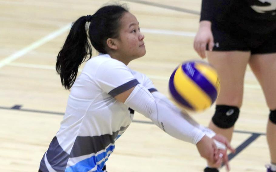 Osan's Margaux Edquid bumps the ball during Saturday's DODEA-Korea girls volleyball match at Humphreys. The Blackhawks won in five sets.