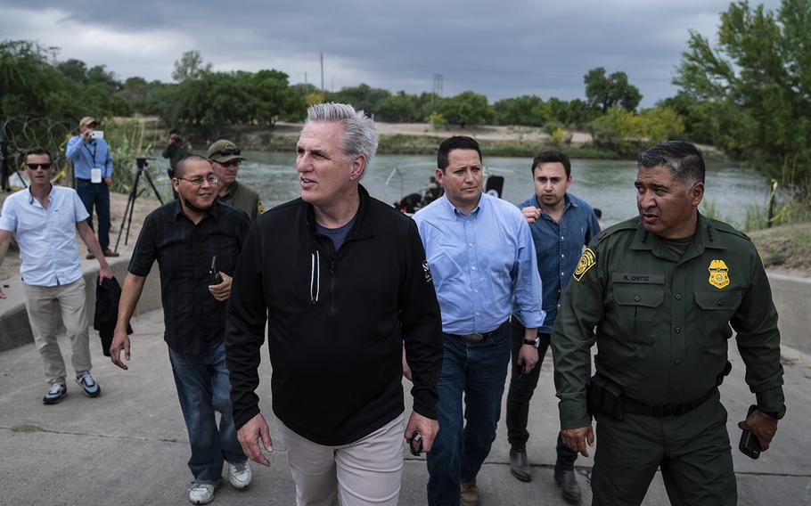 House Minority Leader Kevin McCarthy, R-Calif., tours the U.S.-Mexico border in April 2022 in Eagle Pass, Texas.