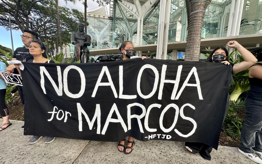 Demonstrators gather outside the Hawaii Convention Center in Honolulu, Saturday, Nov. 18, 2023, to protest a visit by Philippines President Ferdinand Marcos Jr., and recall the actions taken by his late dictator father, Ferdinand Marcos Sr. The younger Marcos and current president was in Honolulu for a whirlwind trip on the way home from the Asia-Pacific Economic Cooperation summit in San Francisco to emphasize U.S.-Philippines relations and meet with Filipino community members in Hawaii.