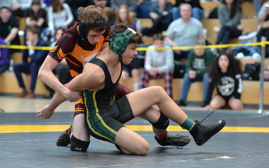 Vilseck’s Johnathan Wissemann, left, beat Alconbury’s Edison Vega Figueroa to take the 113-pound title at the DODEA-Europe wrestling finals in Wiesbaden, Germany, Feb. 10, 2024.