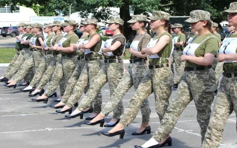 Ukraine’s defense ministry released photos showing female cadets drilling for an Aug. 24 independence day procession in camouflage pants and black pumps with chunky heels.