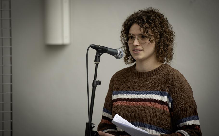 Local student Gisela Looper shares insights into the historical significance of Husterhöh Kaserne during the unveiling of the new bilingual audio tour stop in Pirmasens, Germany, on Wednesday, May 8, 2024. She voiced the German audio portion of the station.