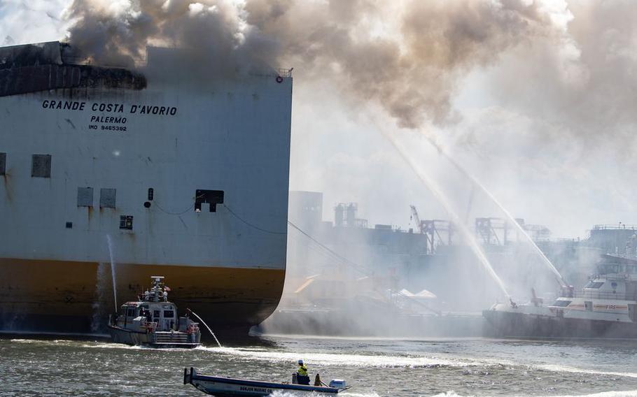 Fireboats pour water on the Grande Costa DAvorio, where two Newark, N.J., firefighters died battling the blaze that began on July 5, 2023.