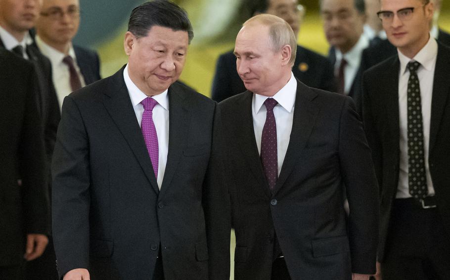 Chinese President Xi Jinping, left, and Russian President Vladimir Putin enter a hall for talks in the Kremlin in Moscow, Russia, June 5, 2019. According to reports on Thursday, Feb. 3, 2022, Putin is heading to Beijing on a trip intended to help strengthen Russia’s ties with China and coordinate their policies amid Western pressure. 