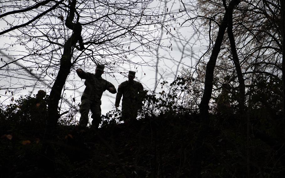 Soldiers with the U.S. Army Correction Facility-Europe search for a missing prisoner during an exercise at Sembach Kaserne, Germany, Dec. 14, 2023. 