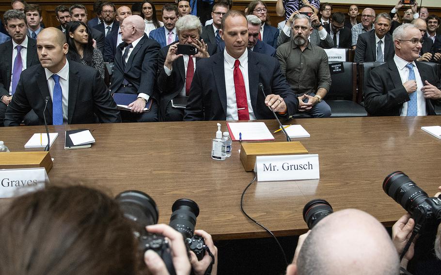David Grusch, a former intelligence officer with the Air Force, claimed “non-human biologics” have been found at alleged crash sites during testimony Wednesday, July 26, 2023, at a House Oversight subcommittee hearing on Unidentified Anomalous Phenomena on Capitol Hill. At left is Ryan Graves, a former Navy F-18 pilot and executive director of Americans for Safe Aerospace. At right is retired Navy Cmdr. David Fravor.