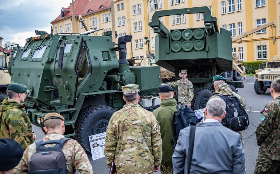 U.S. and NATO military leaders receive a tour of the M142 High Mobility Artillery Rocket System during a three-day summit in Torun, Poland, April 18, 2023.