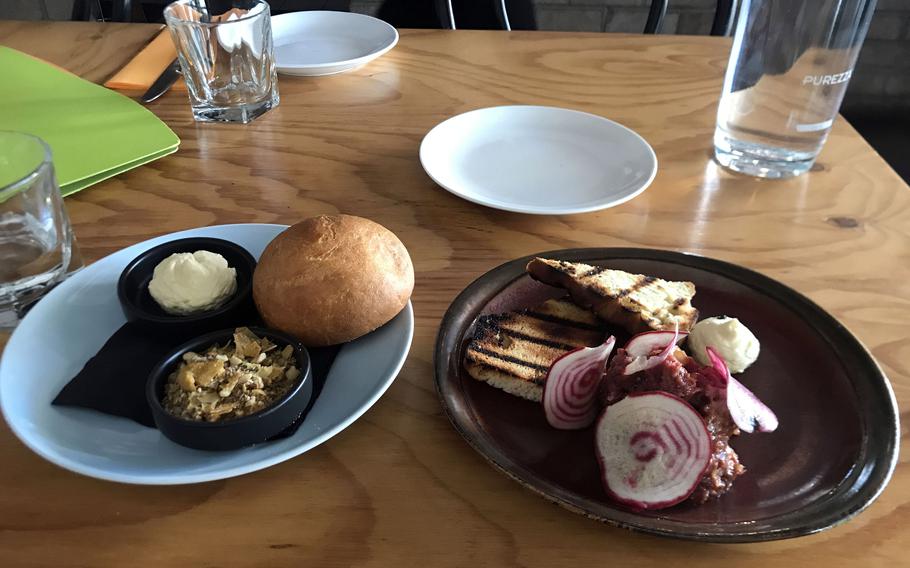 The Home Made ‘One Mile’ Damper, left, and kangaroo tartar from the Phat Mango restaurant in Darwin, Australia. 