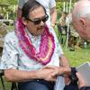 Dennis Fujii, left, speaks with retired Army Gen. David Bramlett before Fujii’s induction into the Gallery of Heroes at the Army Museum of Hawaii at Fort DeRussy on March 15, 2024.