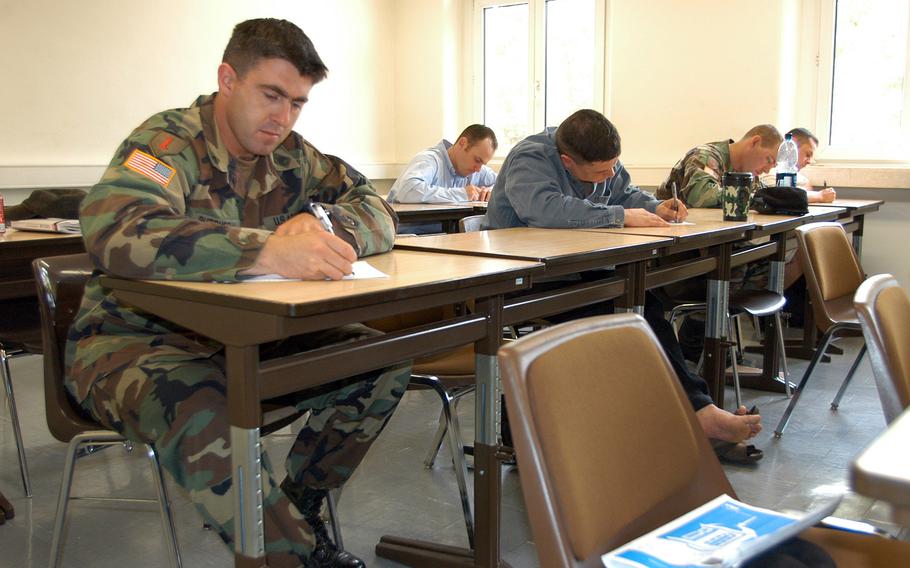 Students take a quiz in environmental science during a University of Maryland Global Campus course at the Army education centerin Bamberg, Germany, in 2005.