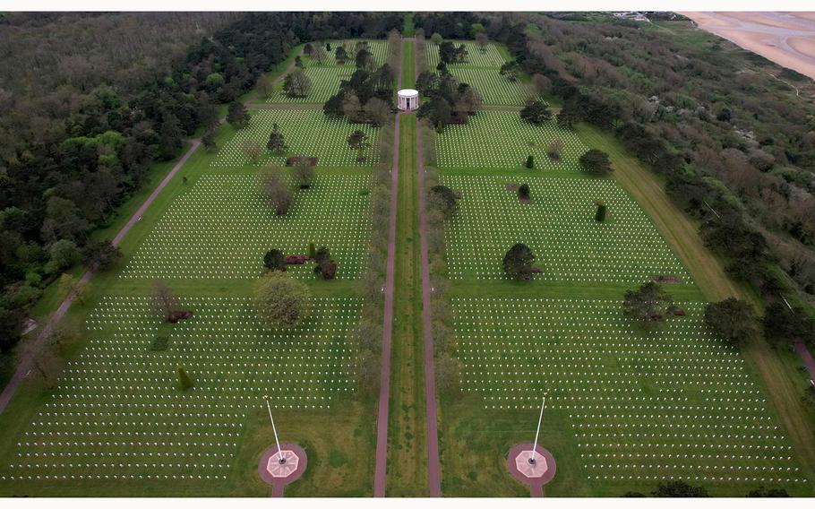 A drone view shows the World War II Normandy American Cemetery and Memorial at Colleville-sur-Mer, situated above Omaha Beach, Normandy region, France, April 11, 2024. 