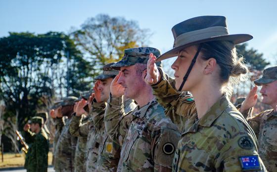 Troops from Japan, the United States and Australia attend an opening ceremony for the Yama Sakura exercise at Camp Asaka in Tokyo, Monday, Dec. 4, 2023.