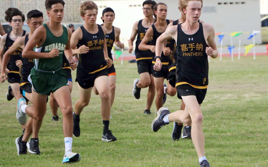 Kadena's Cullen Oglesbee leads the pack outbound during Friday's Okinawa season-opening cross country race. Oglesbee won with a time of 17 minutes, 36 seconds.