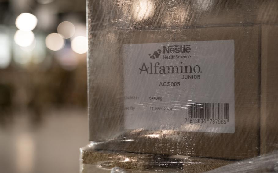 A box of Nestle Alfamino Junior baby formula waits at Ramstein Air Base, Germany, on Saturday, May 21, 2022, before being flown to the United States.