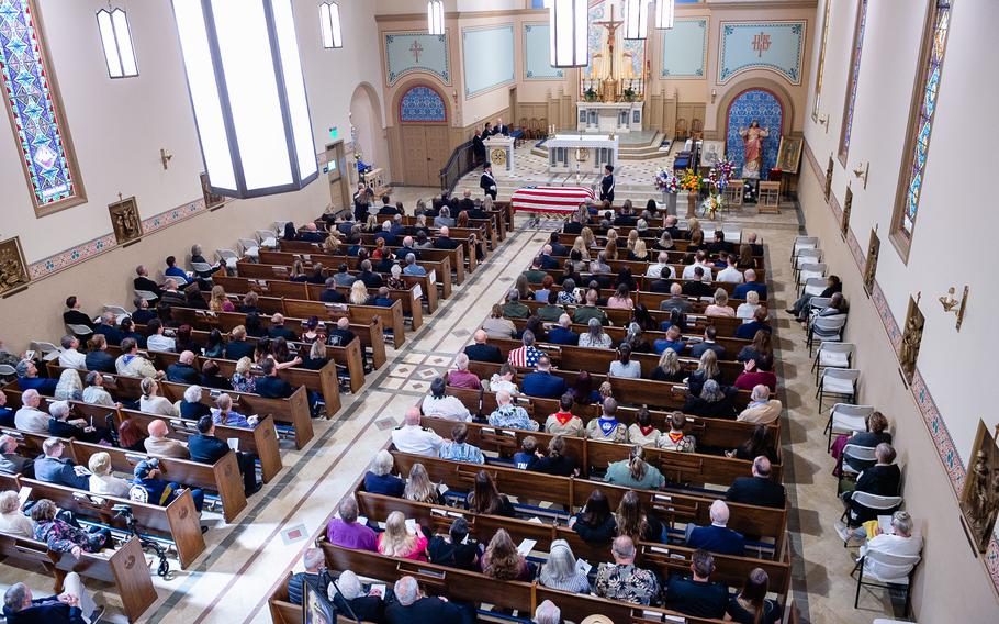 Family, friends, military personnel, and community leaders gather at the St. Patrick Catholic Church for retired Lt. Cmdr. Lou Conter’s memorial service.