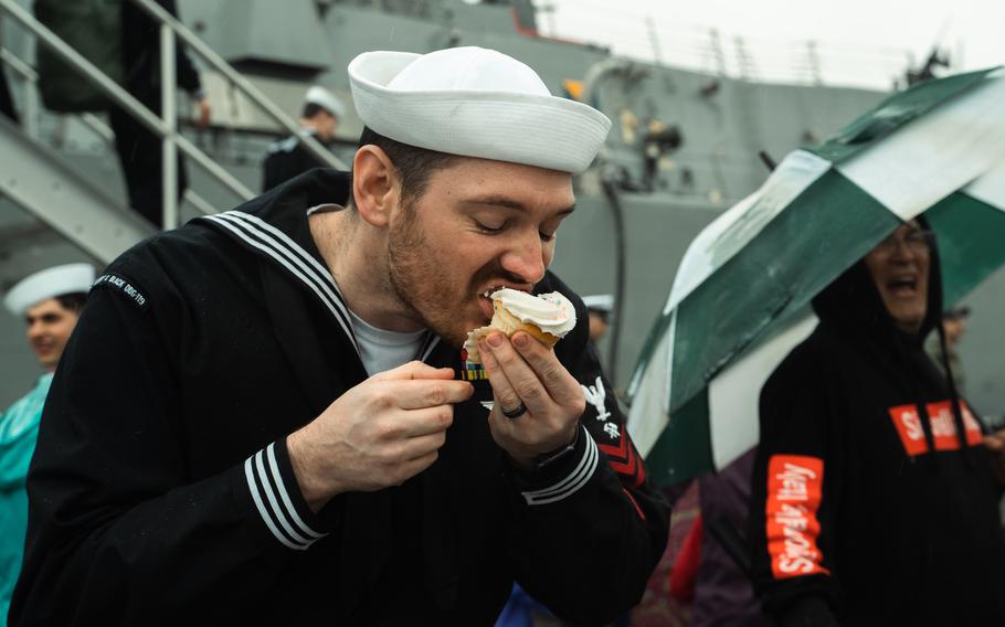 A USS Delbert D. Black sailor enjoys a cupcake after returning to Naval Station Mayport, Fla., on Sunday, Feb. 18, 2024.