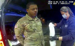 In this image from Windsor, Va., police body camera footage, U.S. Army Lt. Caron Nazario is helped by an EMT after he was pepper-sprayed by Windsor police during a traffic stop in Windsor, Dec. 20, 2020. In a legal brief filed in the 4th U.S. Circuit Court of Appeals in Richmond, Va., on Monday, Oct. 2, 2023, Nazario argues that a U.S. District Court judge was wrong when he found in a ruling before the trial that officers Joe Gutierrez and Daniel Crocker had probable cause to believe Nazario committed the crimes of eluding police, obstruction of justice and failure to obey an order from a police officer.