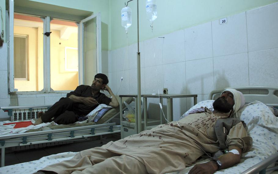 Injured workers of HALO Trust de-mining organization are treated at a hospital in northern Baghlan province, Afghanistan, Wednesday, June 9, 2021. Workers of the organization were attacked on Tuesday night by the armed gunmen. 